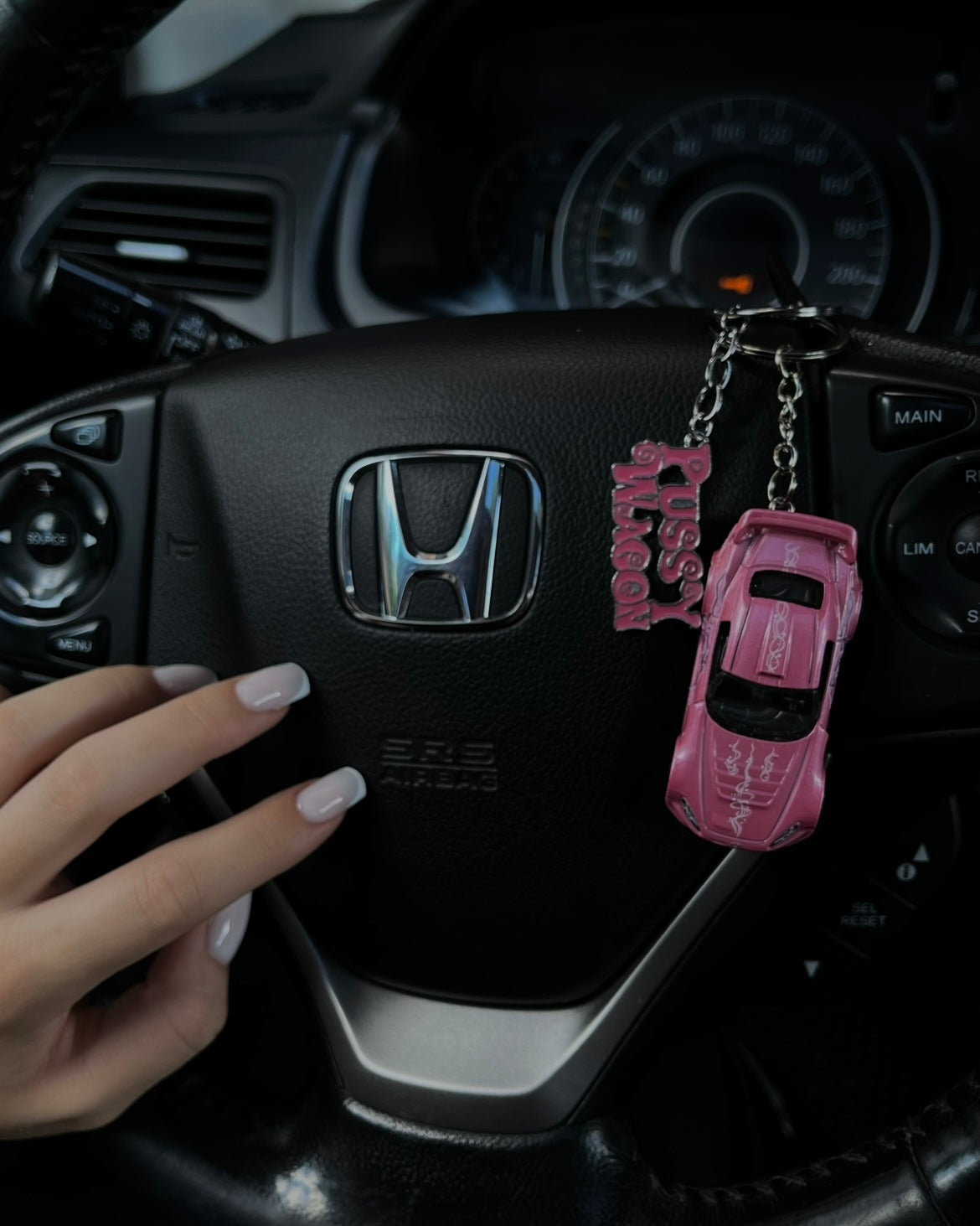 Couple Fast and Furious keychains (Brian's and Suki's)