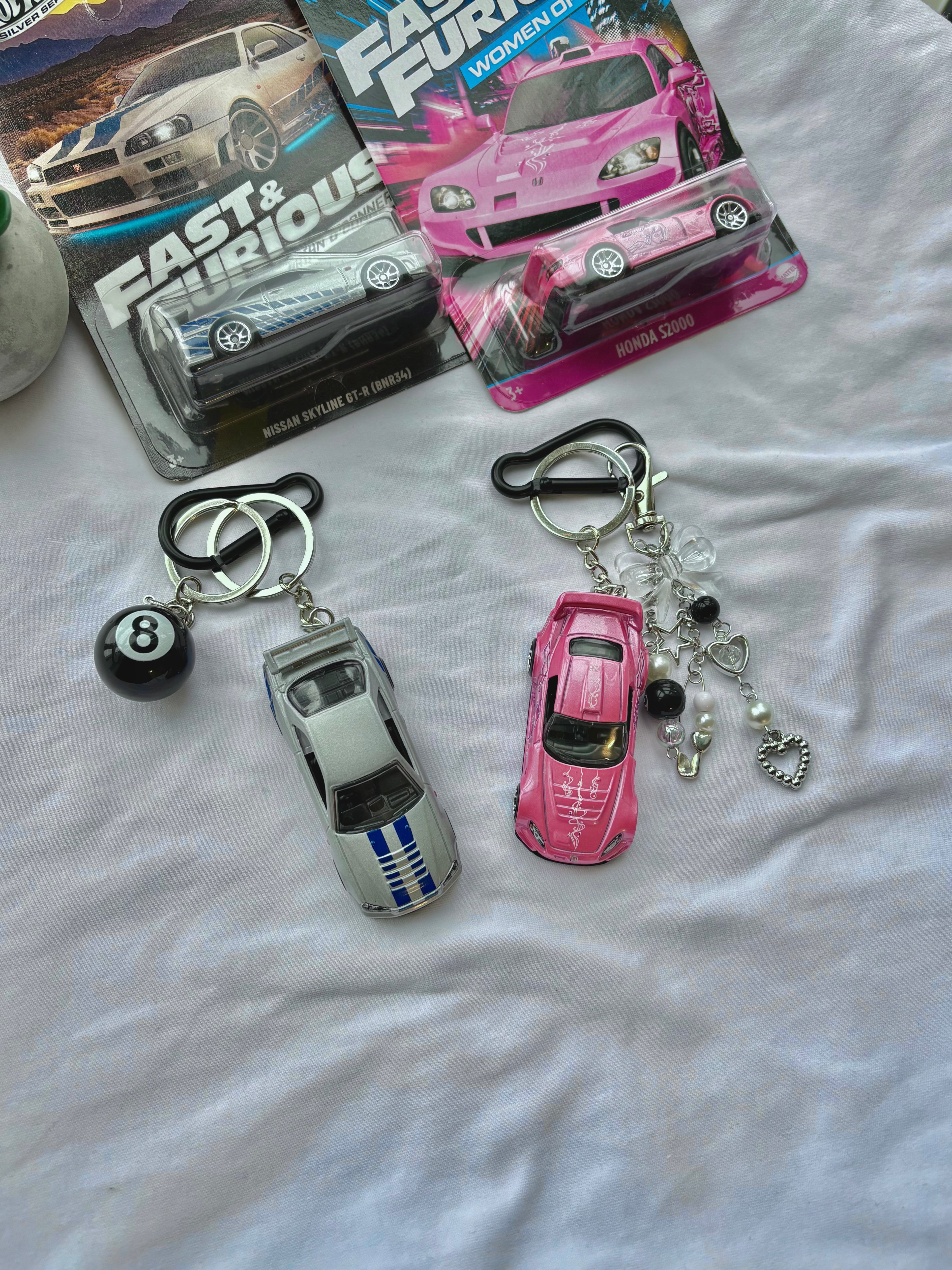 Couple Fast and Furious keychains (Brian's and Suki's)