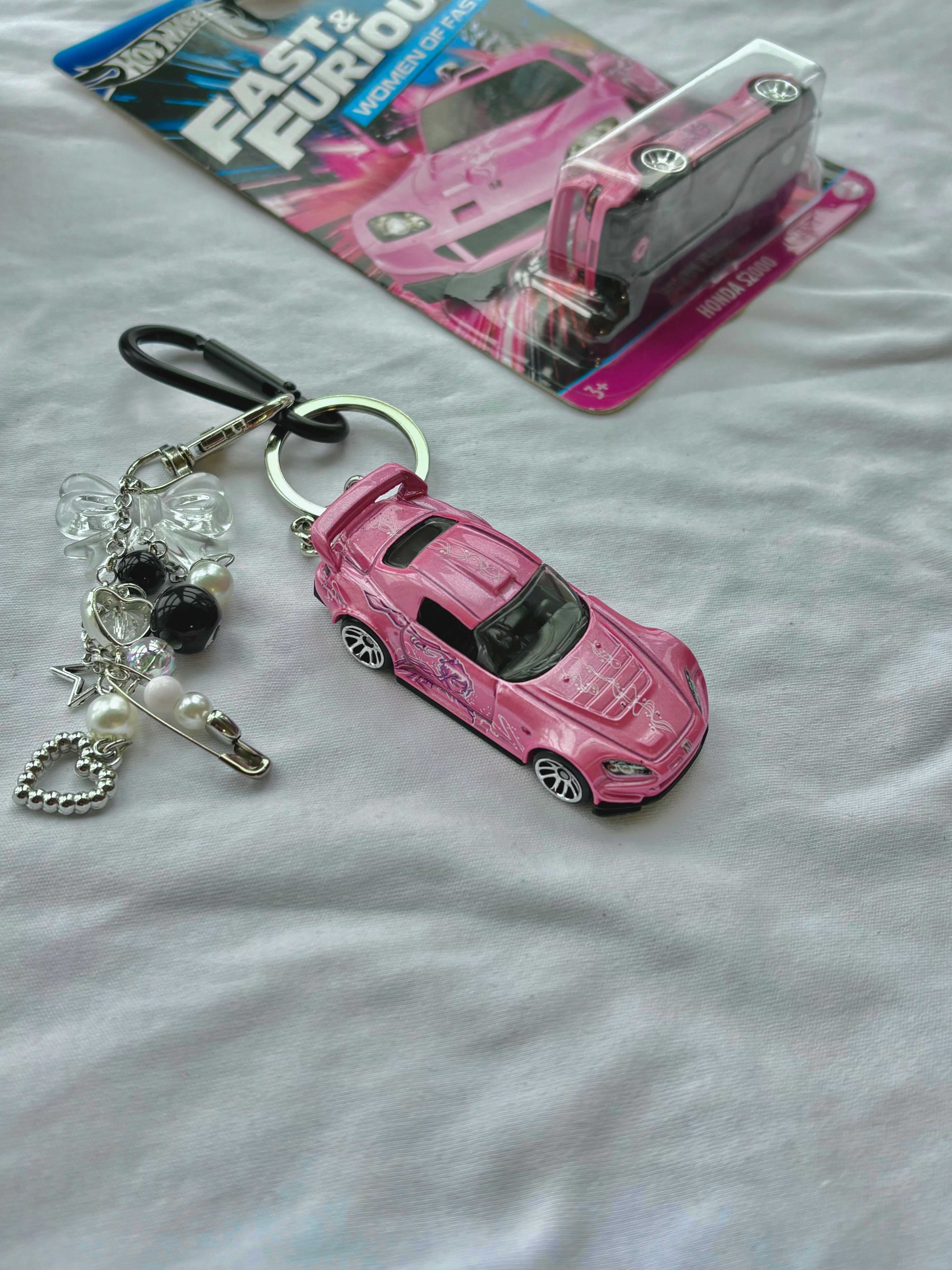 Couple Fast and Furious keychains (Brian's and Suki's)