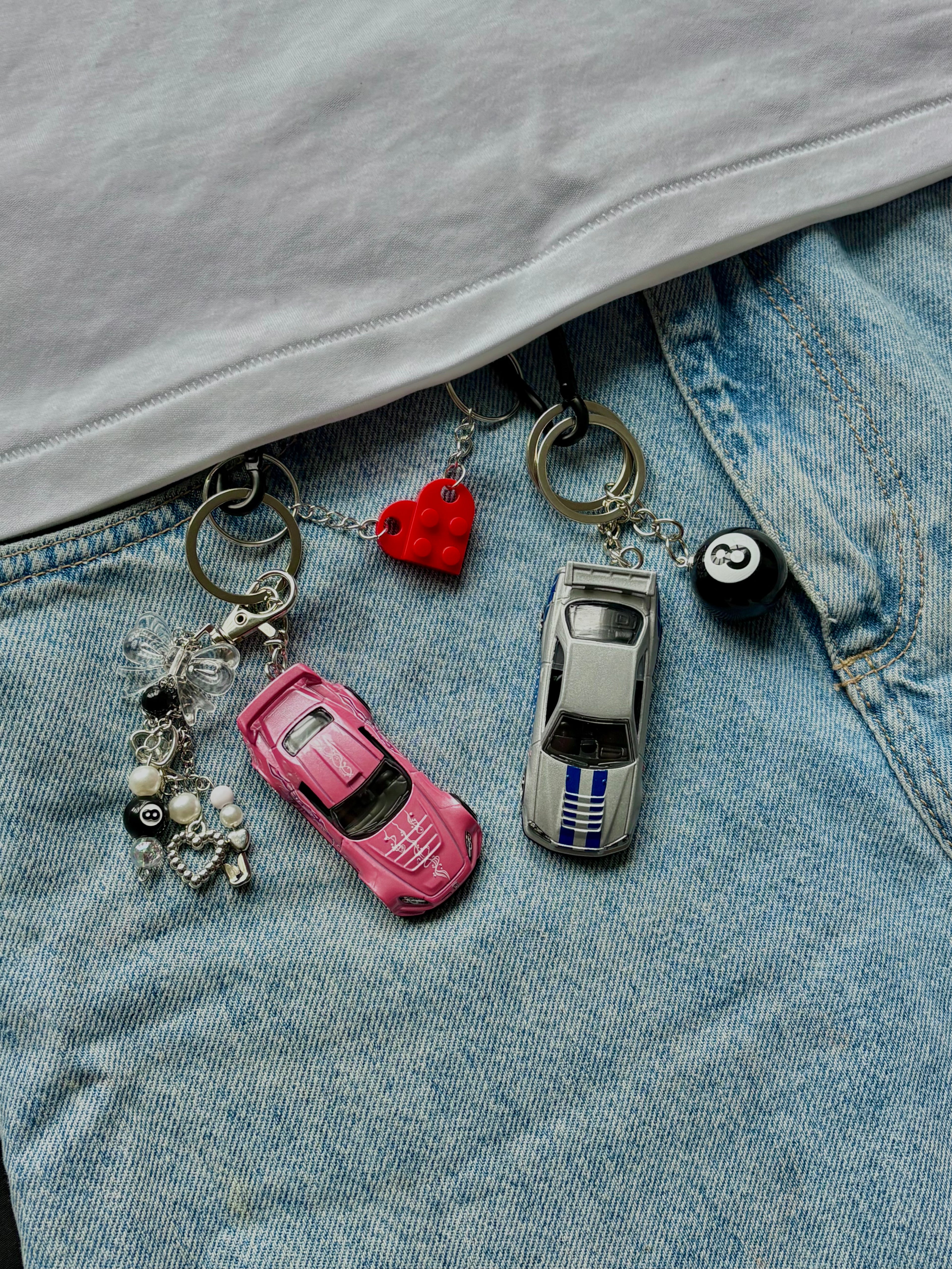 Couple Fast and Furious keychains (Brian's and Suki's)