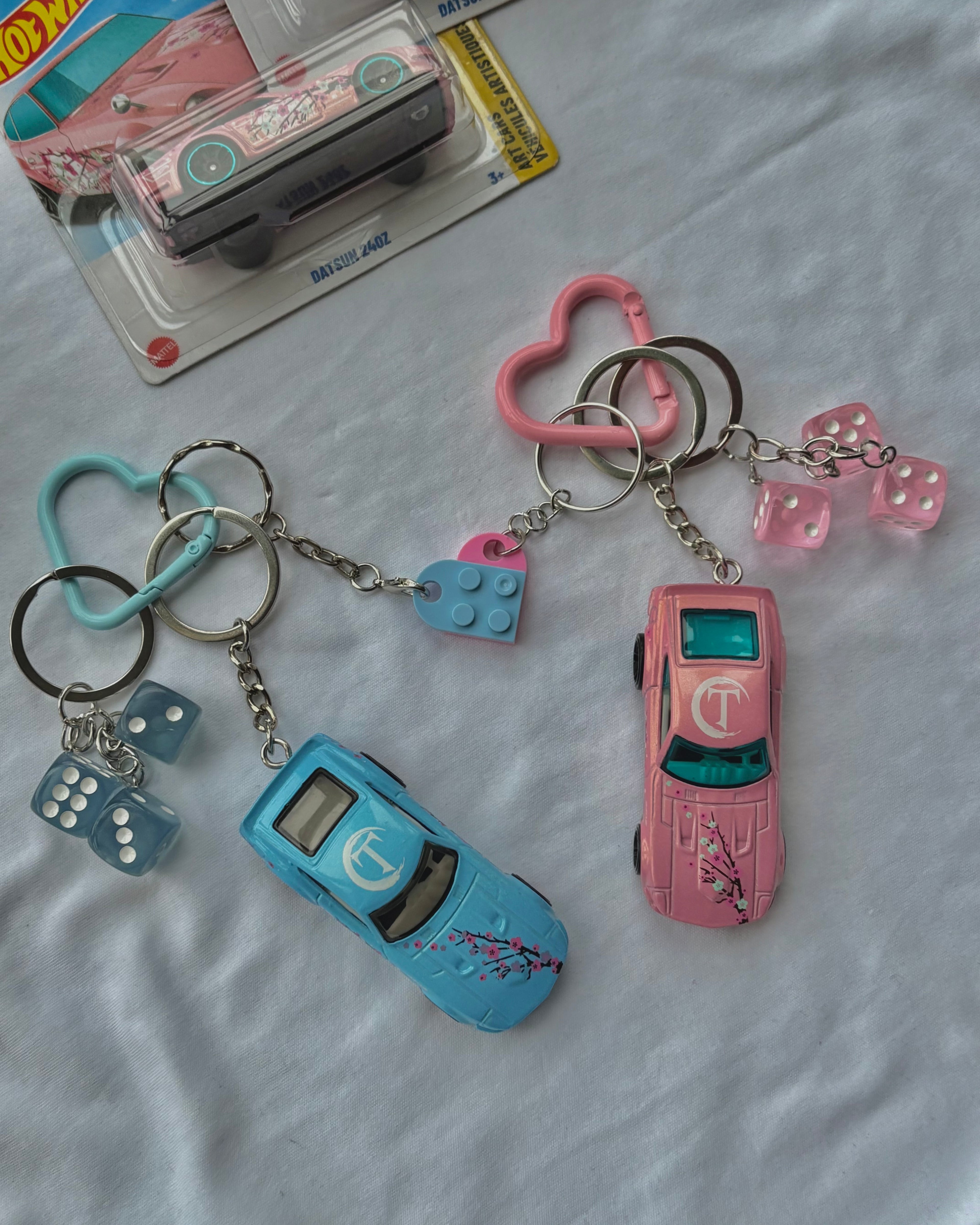 Couple arizona keychains (Datsun 240Z)