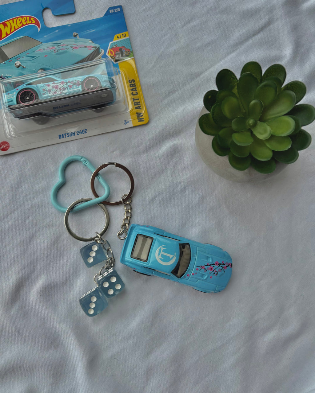 Couple arizona keychains (Datsun 240Z)