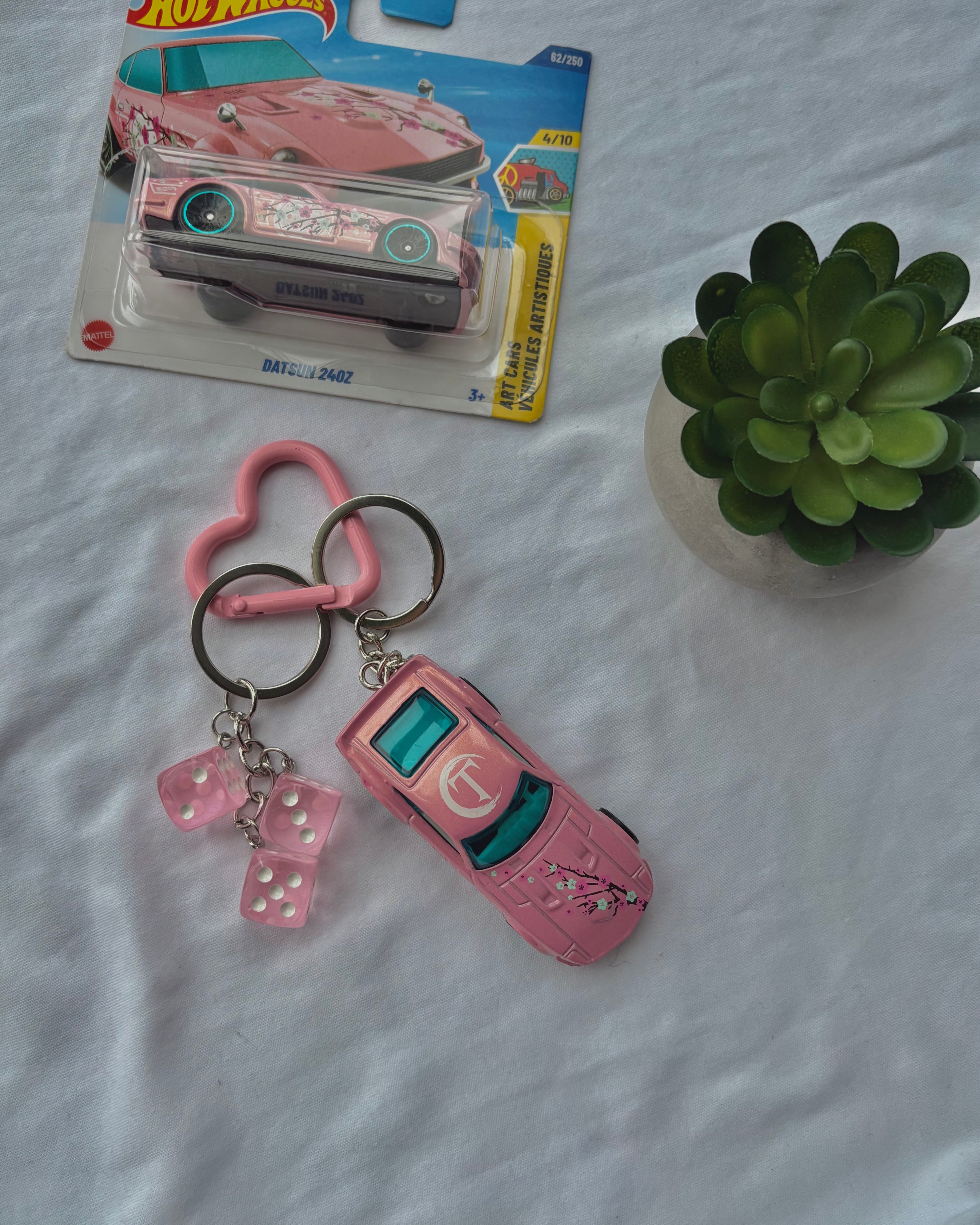 Couple arizona keychains (Datsun 240Z)