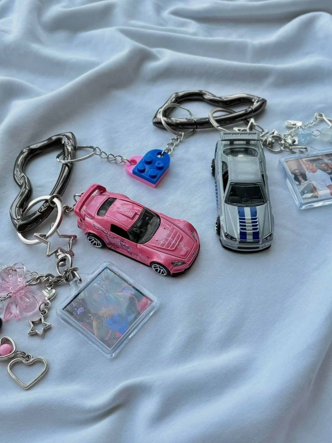 Couple Fast and Furious keychains (Brian's and Suki's)