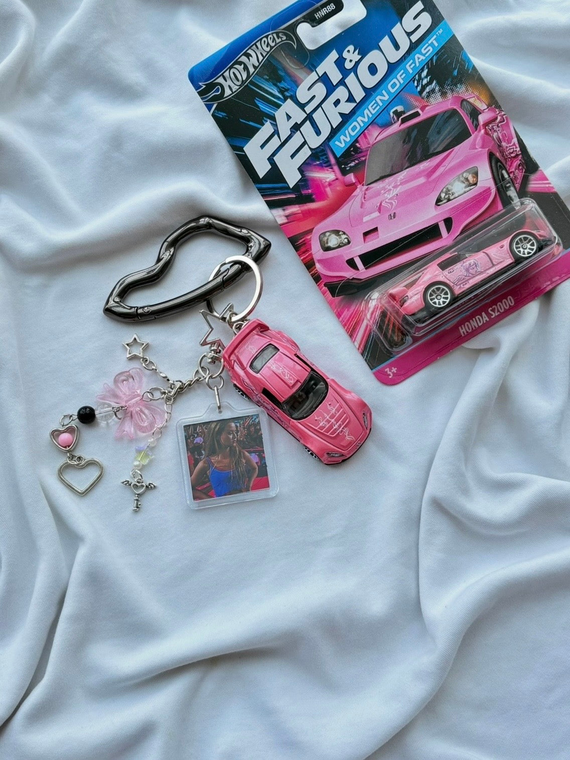 Couple Fast and Furious keychains (Brian's and Suki's)
