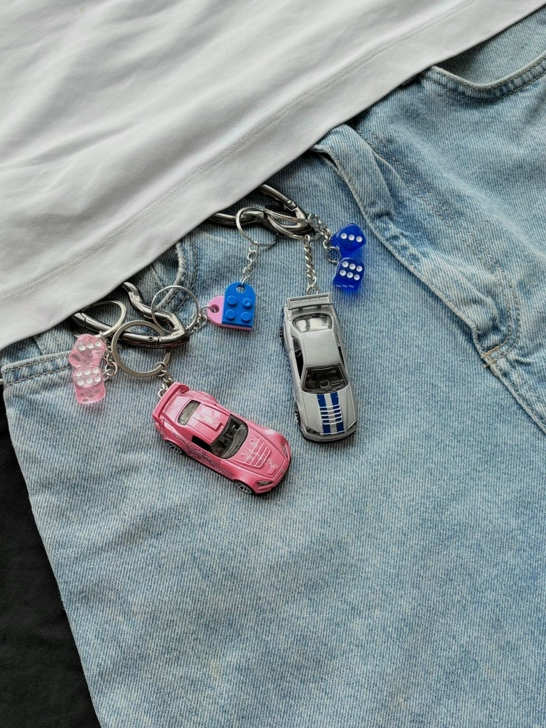 Couple Fast and Furious keychains (Brian's and Suki's)