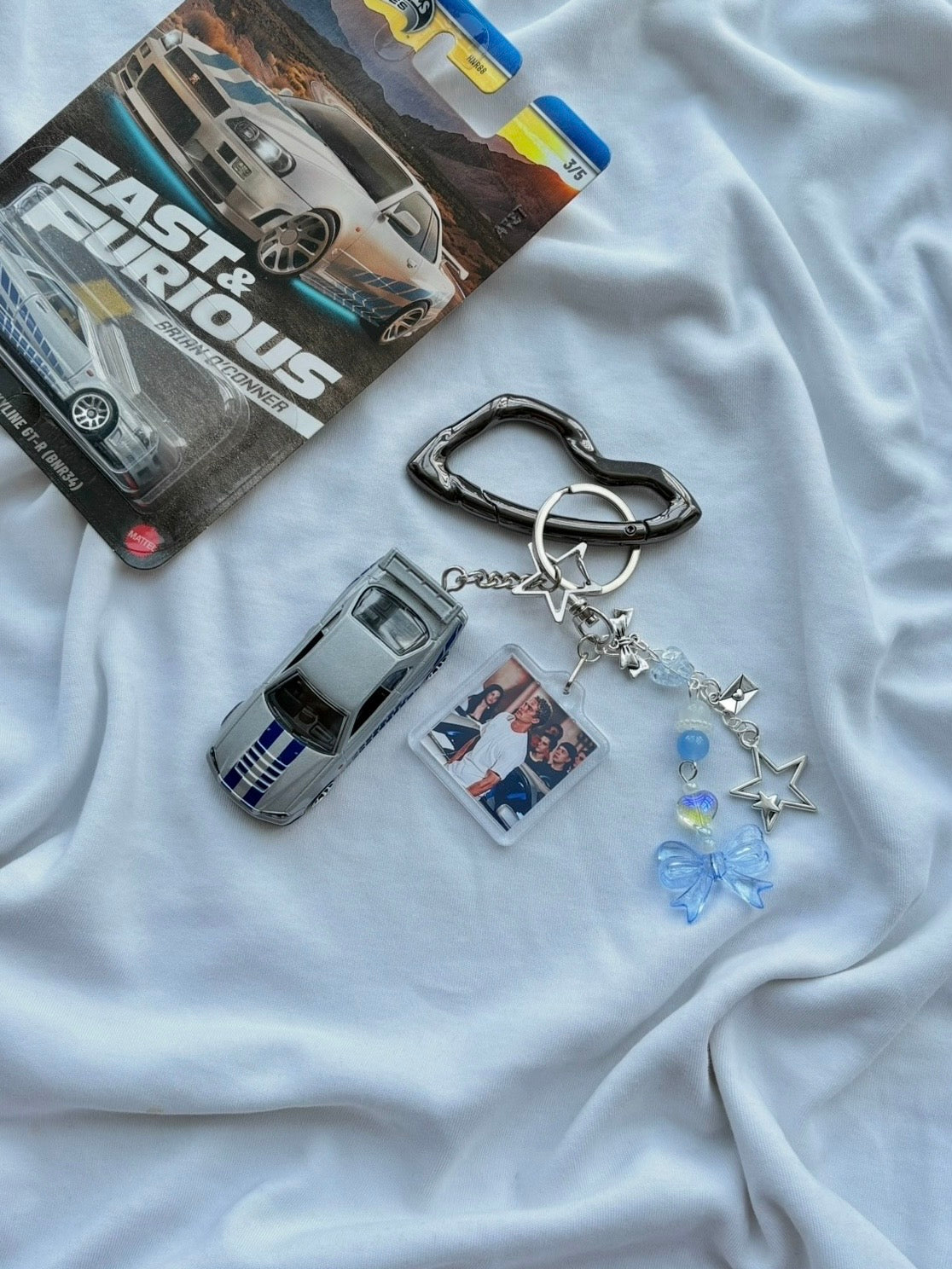 Couple Fast and Furious keychains (Brian's and Suki's)