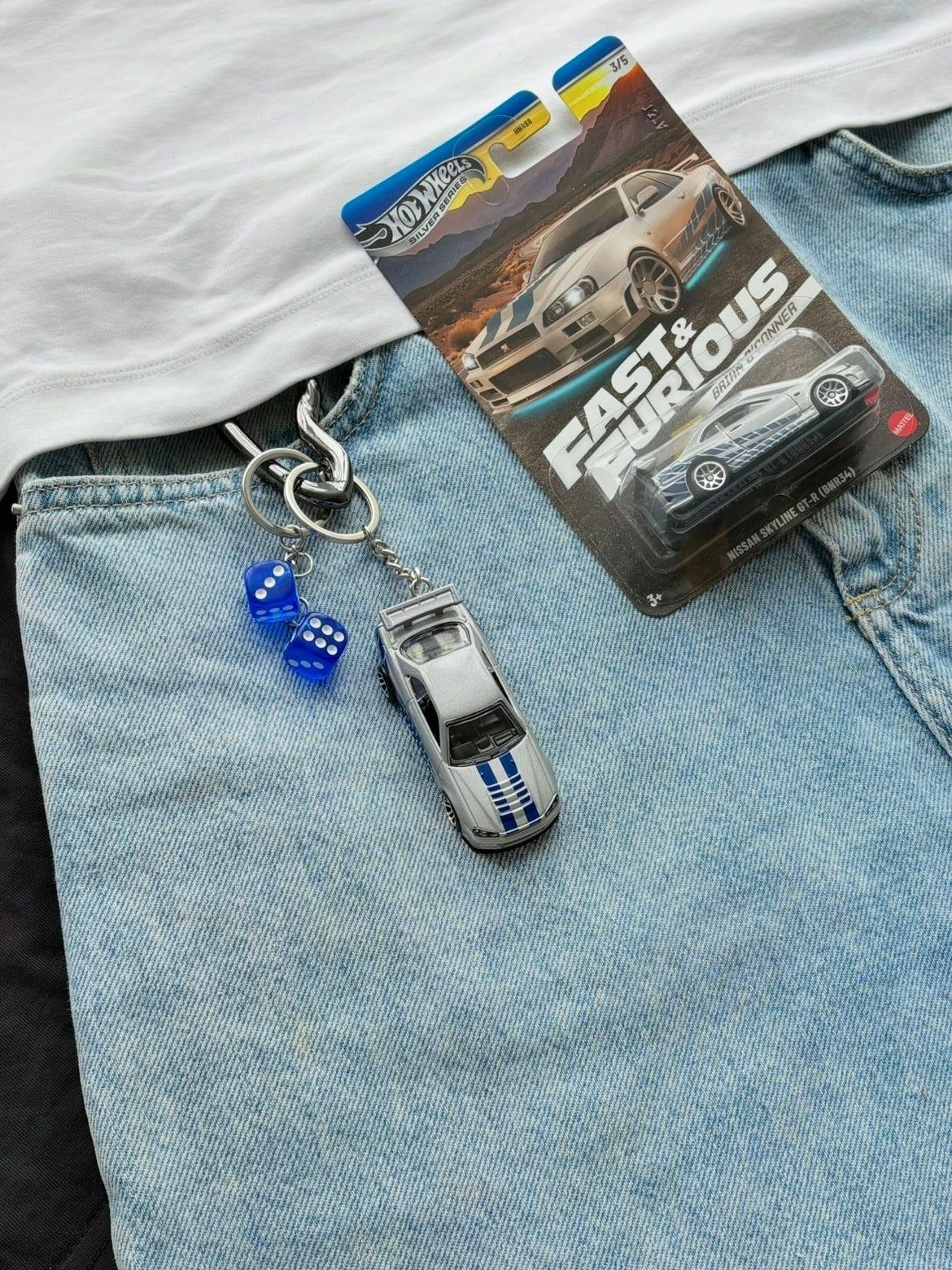 Couple Fast and Furious keychains (Brian's and Suki's)