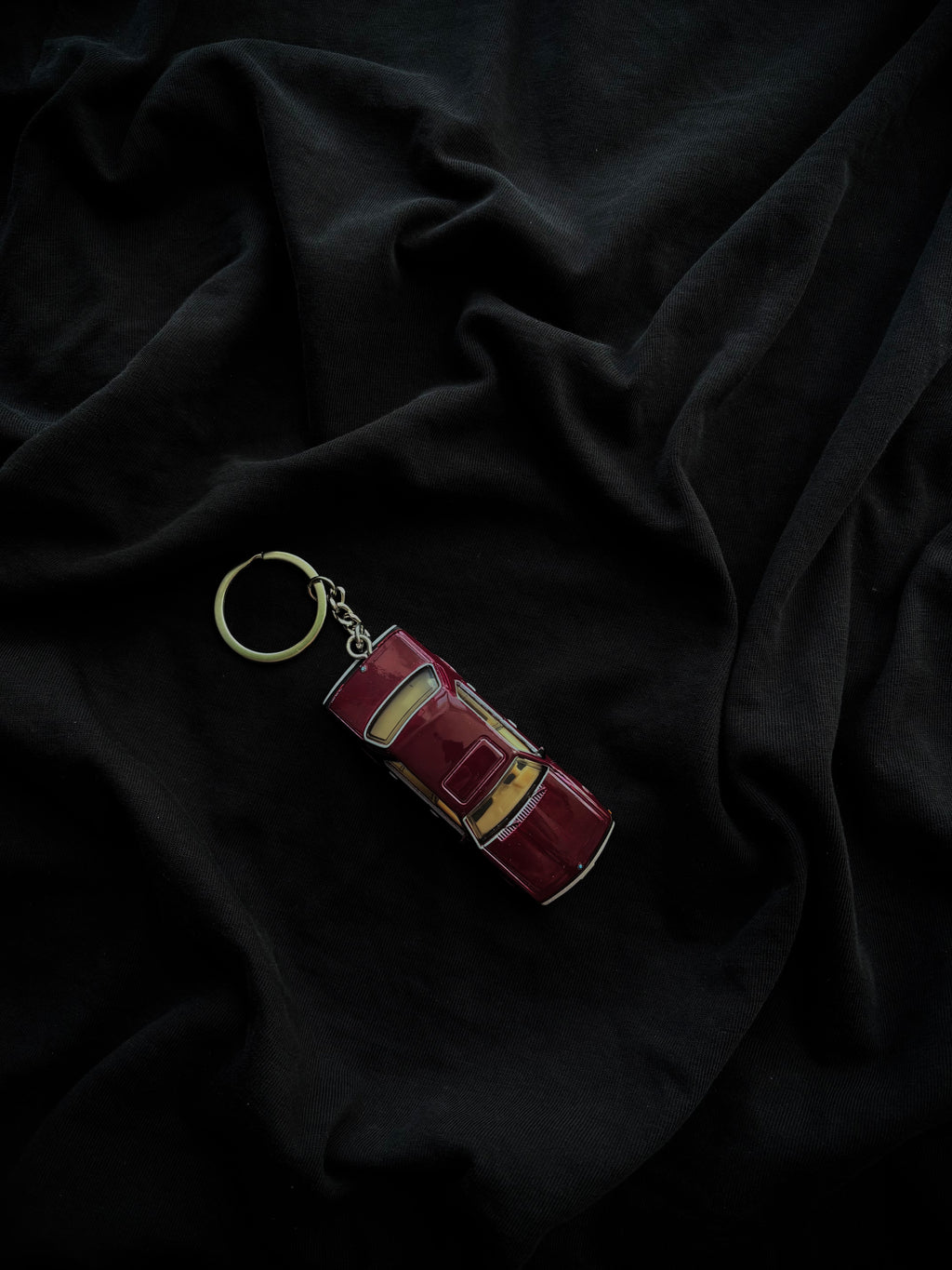 Hot Wheels keychain BMW 733i from Stranger Things